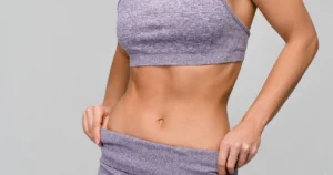 women showing weight of her with Peptide Therapy for Weight Management in Austin, TX